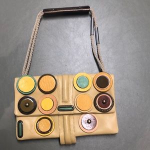 Jamin Puech handbag, leather with fun leather, wood and molded plastic circles.